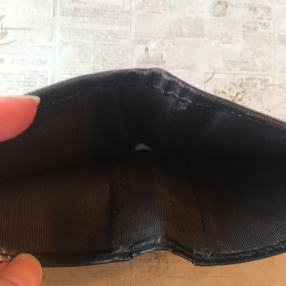 Calvin Klein Textured Leather Bi-Fold Wallet